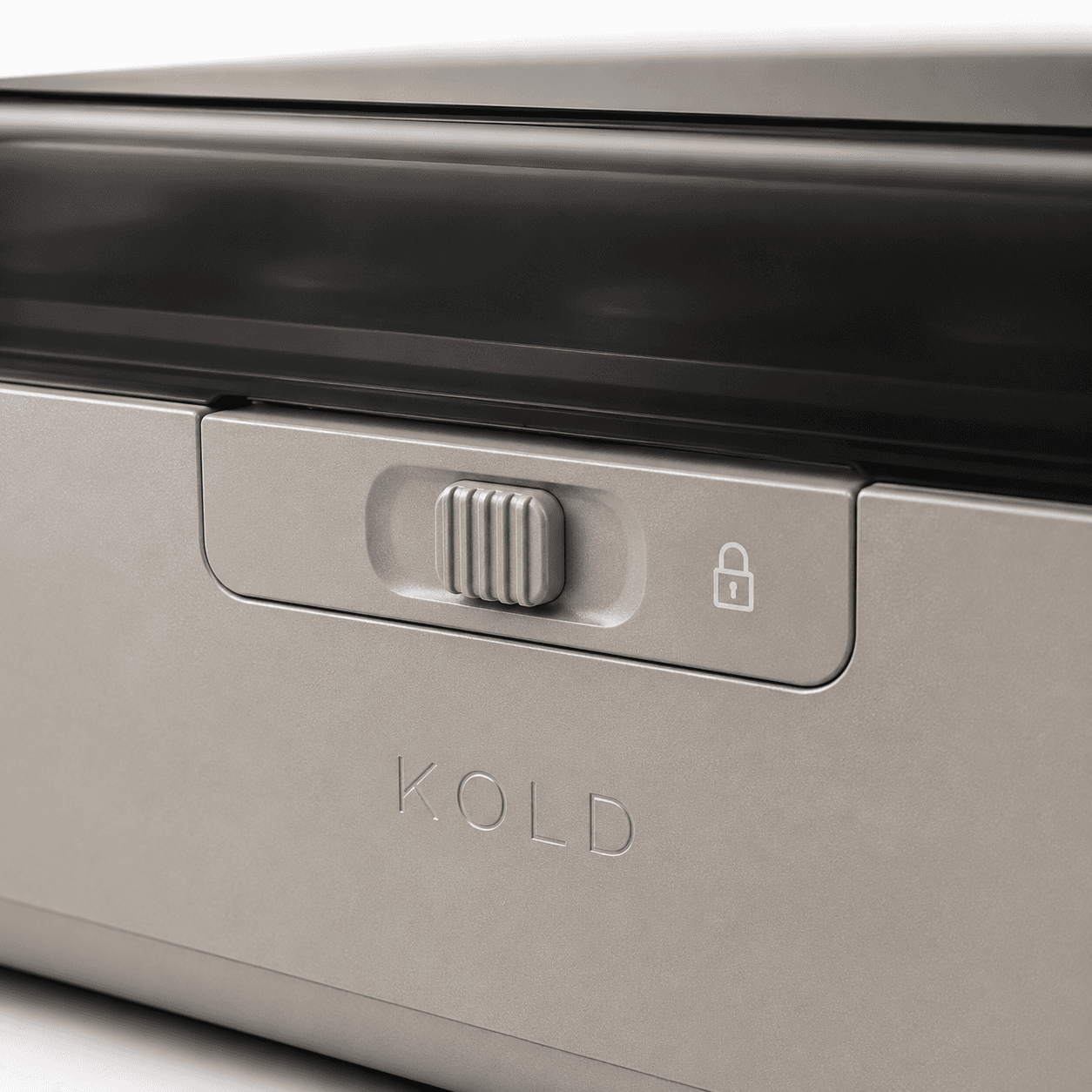 The KOLD lock slider and engraved wordmark on the case front